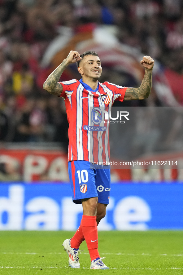 Angel Correa right winger of Atletico de Madrid and Argentina celebrates after scoring his sides first goal during the LaLiga match between...