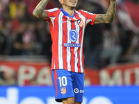 Angel Correa right winger of Atletico de Madrid and Argentina celebrates after scoring his sides first goal during the LaLiga match between...