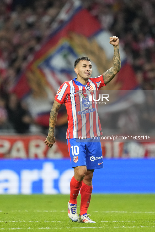 Angel Correa right winger of Atletico de Madrid and Argentina celebrates after scoring his sides first goal during the LaLiga match between...