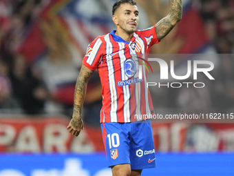 Angel Correa right winger of Atletico de Madrid and Argentina celebrates after scoring his sides first goal during the LaLiga match between...