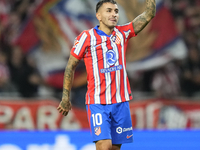 Angel Correa right winger of Atletico de Madrid and Argentina celebrates after scoring his sides first goal during the LaLiga match between...