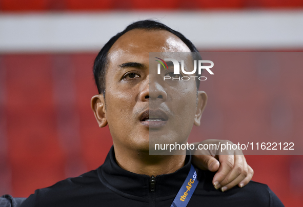 Singapore head coach Mohamed Fadzuhasny looks on before the 2025 AFC U20 Asian Cup Qualifiers Group J match between Singapore and Hong Kong,...