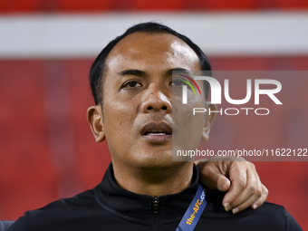 Singapore head coach Mohamed Fadzuhasny looks on before the 2025 AFC U20 Asian Cup Qualifiers Group J match between Singapore and Hong Kong,...