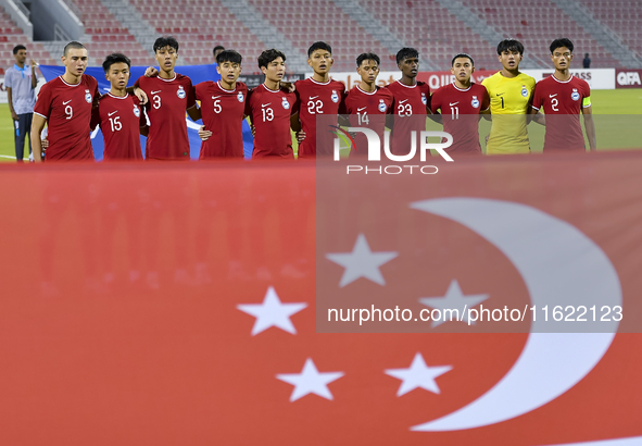 Players from Singapore line up before the 2025 AFC U20 Asian Cup Qualifiers Group J match between Singapore and Hong Kong, China, at Grand H...