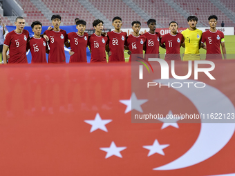 Players from Singapore line up before the 2025 AFC U20 Asian Cup Qualifiers Group J match between Singapore and Hong Kong, China, at Grand H...