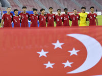 Players from Singapore line up before the 2025 AFC U20 Asian Cup Qualifiers Group J match between Singapore and Hong Kong, China, at Grand H...