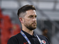 Hong Kong, China head coach Darren Arnott looks on before the 2025 AFC U20 Asian Cup Qualifiers Group J match between Singapore and Hong Kon...