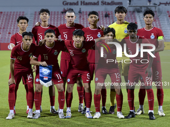 Singapore players pose for a team photo prior to the 2025 AFC U20 Asian Cup Qualifiers Group J match between Singapore and Hong Kong, China,...