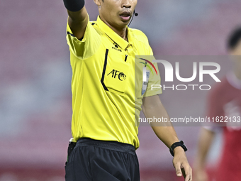 Referee Wiwat Jumpaoon of Thailand gestures during the 2025 AFC U20 Asian Cup Qualifiers Group J match between Singapore and Hong Kong, Chin...