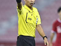 Referee Wiwat Jumpaoon of Thailand gestures during the 2025 AFC U20 Asian Cup Qualifiers Group J match between Singapore and Hong Kong, Chin...