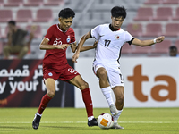 Muhammad Hud Bin Muhammad Ismail (L) of Singapore battles for the ball with Lam Ho Hei (R) of Hong Kong, China, during the 2025 AFC U20 Asia...