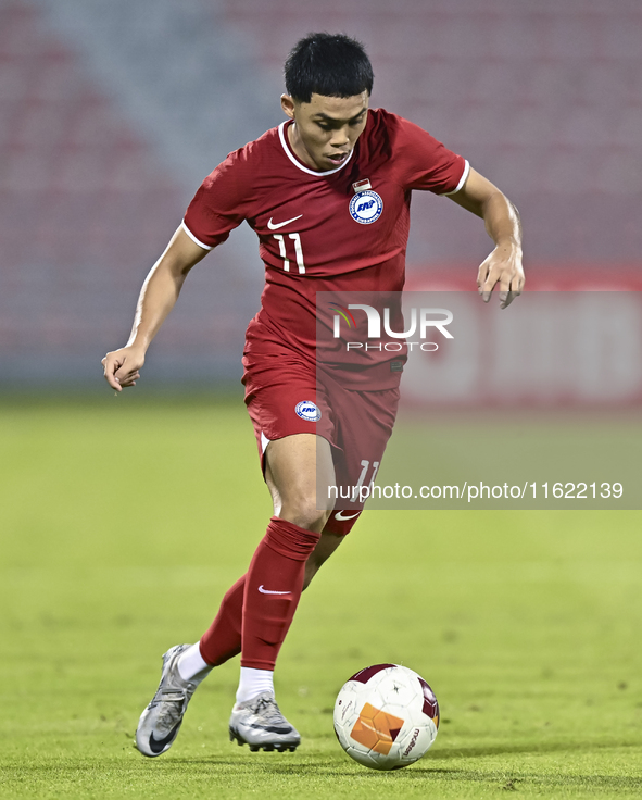 Fairuz Fazli of Singapore and Lam Ho Hei during the 2025 AFC U20 Asian Cup Qualifiers Group J match between Singapore and Hong Kong, China,...