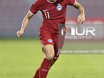 Fairuz Fazli of Singapore and Lam Ho Hei during the 2025 AFC U20 Asian Cup Qualifiers Group J match between Singapore and Hong Kong, China,...