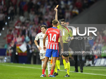 Referee Mateo Busquets Ferrer  show red card to Marcos Llorente central midfield of Atletico de Madrid and Spain during the LaLiga match bet...