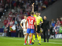 Referee Mateo Busquets Ferrer  show red card to Marcos Llorente central midfield of Atletico de Madrid and Spain during the LaLiga match bet...