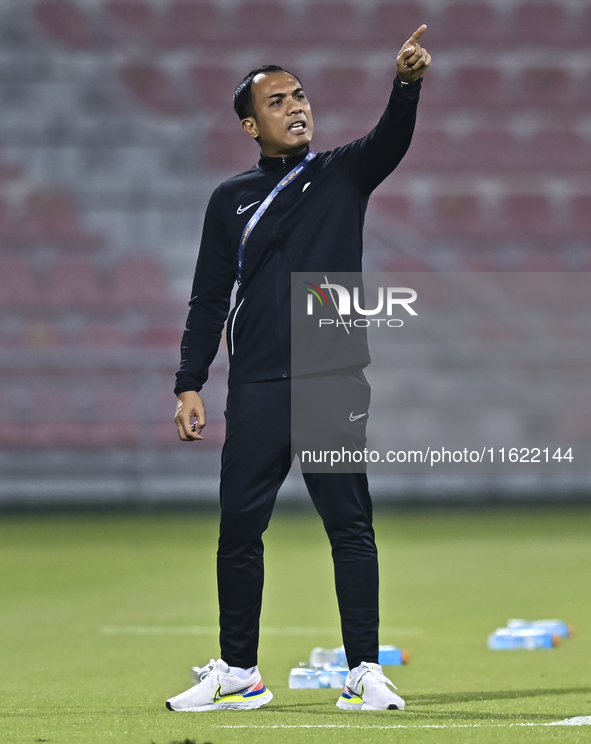 Mohamed Fadzuhasny, Head Coach of Singapore, reacts during the 2025 AFC U20 Asian Cup Qualifiers Group J match between Singapore and Hong Ko...