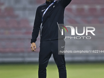 Mohamed Fadzuhasny, Head Coach of Singapore, reacts during the 2025 AFC U20 Asian Cup Qualifiers Group J match between Singapore and Hong Ko...