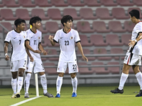 Anthony Pinto (L) of Hong Kong, China, celebrates after scoring the opening goal during the 2025 AFC U20 Asian Cup Qualifiers Group J match...