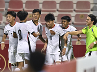 Ho Tung Lam (C) of Hong Kong, China, celebrates after scoring the second goal during the 2025 AFC U20 Asian Cup Qualifiers Group J match bet...