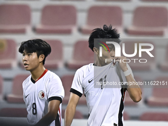 Ho Tung Lam (R) of Hong Kong, China, celebrates after scoring the second goal during the 2025 AFC U20 Asian Cup Qualifiers Group J match bet...