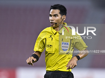 Referee Wiwat Jumpaoon of Thailand gestures during the 2025 AFC U20 Asian Cup Qualifiers Group J match between Singapore and Hong Kong, Chin...