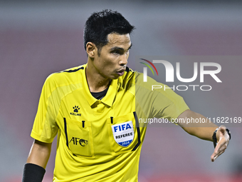 Referee Wiwat Jumpaoon of Thailand gestures during the 2025 AFC U20 Asian Cup Qualifiers Group J match between Singapore and Hong Kong, Chin...