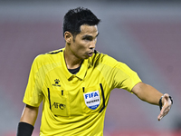 Referee Wiwat Jumpaoon of Thailand gestures during the 2025 AFC U20 Asian Cup Qualifiers Group J match between Singapore and Hong Kong, Chin...