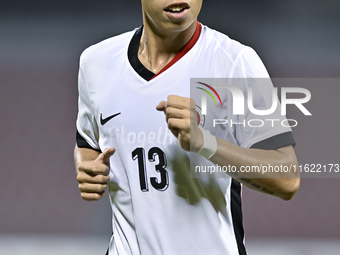 Tsang Lok To Jeremy of Hong Kong, China, is in action during the 2025 AFC U20 Asian Cup Qualifiers Group J match between Singapore and Hong...