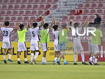 Players from Hong Kong, China celebrate after winning the 2025 AFC U20 Asian Cup Qualifiers Group J match between Singapore and Hong Kong, C...