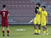 Players from Singapore express their dejection after the 2025 AFC U20 Asian Cup Qualifiers Group J match between Singapore and Hong Kong, Ch...