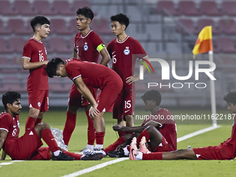 Players from Singapore express their dejection after the 2025 AFC U20 Asian Cup Qualifiers Group J match between Singapore and Hong Kong, Ch...