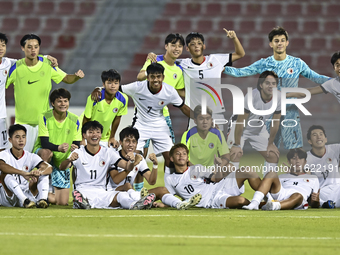 Players from Hong Kong, China celebrate after winning the 2025 AFC U20 Asian Cup Qualifiers Group J match between Singapore and Hong Kong, C...