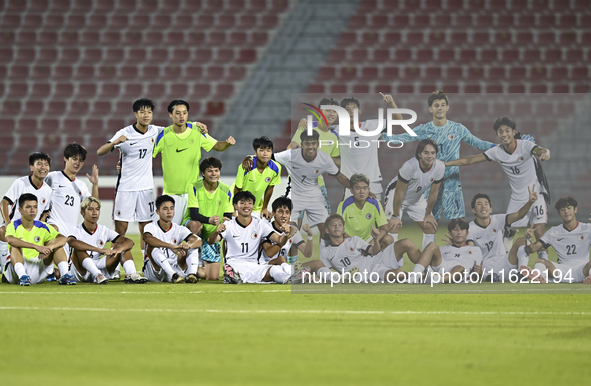 Players from Hong Kong, China celebrate after winning the 2025 AFC U20 Asian Cup Qualifiers Group J match between Singapore and Hong Kong, C...