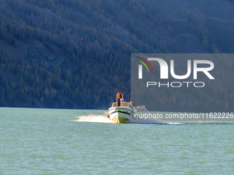 Police patrol Kanas Lake by boat in Altay, China, on September 29, 2024. (