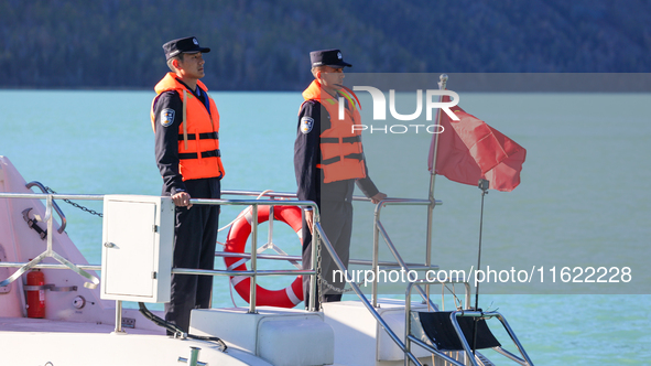 Police patrol Kanas Lake by boat in Altay, China, on September 29, 2024. 