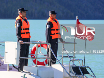 Police patrol Kanas Lake by boat in Altay, China, on September 29, 2024. (