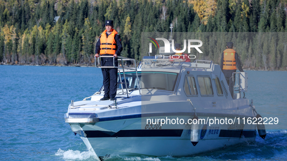 Police patrol Kanas Lake by boat in Altay, China, on September 29, 2024. 