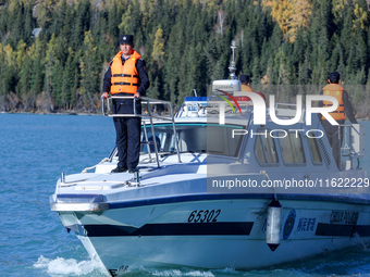 Police patrol Kanas Lake by boat in Altay, China, on September 29, 2024. (