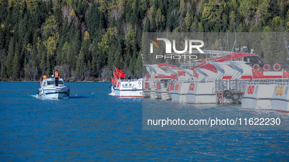 Police patrol Kanas Lake by boat in Altay, China, on September 29, 2024. 