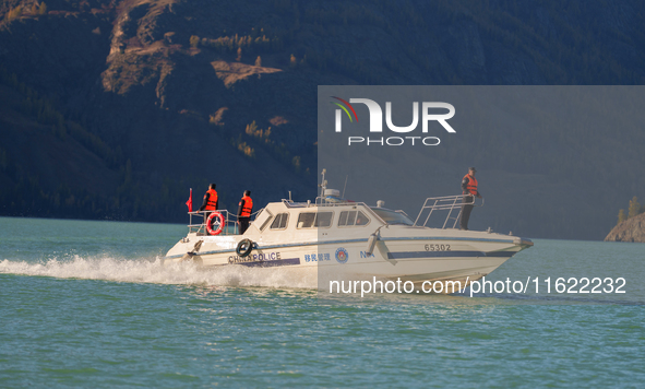 Police patrol Kanas Lake by boat in Altay, China, on September 29, 2024. 