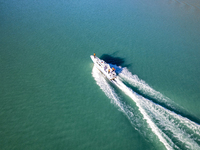 Police patrol Kanas Lake by boat in Altay, China, on September 29, 2024. (