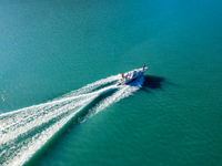 Police patrol Kanas Lake by boat in Altay, China, on September 29, 2024. (