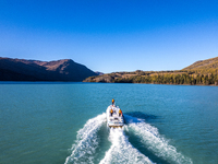 Police patrol Kanas Lake by boat in Altay, China, on September 29, 2024. (