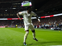 Vinicius Junior left winger of Real Madrid and Brazil celebrates the goal of his team during the LaLiga match between Atletico de Madrid and...