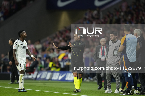 Vinicius Junior left winger of Real Madrid and Brazil reacts during the LaLiga match between Atletico de Madrid and Real Madrid CF  at Estad...