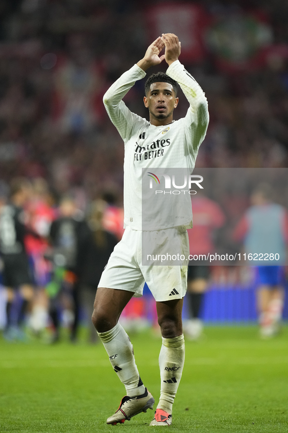 Jude Bellingham central midfield of Real Madrid and England greets after the LaLiga match between Atletico de Madrid and Real Madrid CF  at...