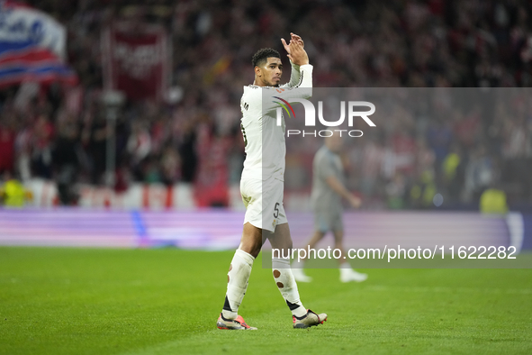 Jude Bellingham central midfield of Real Madrid and England greets after the LaLiga match between Atletico de Madrid and Real Madrid CF  at...