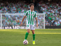 Iker Losada of Real Betis runs with the ball during the La Liga EA Sports match between Real Betis and RCD Espanyol at Benito Villamarin in...