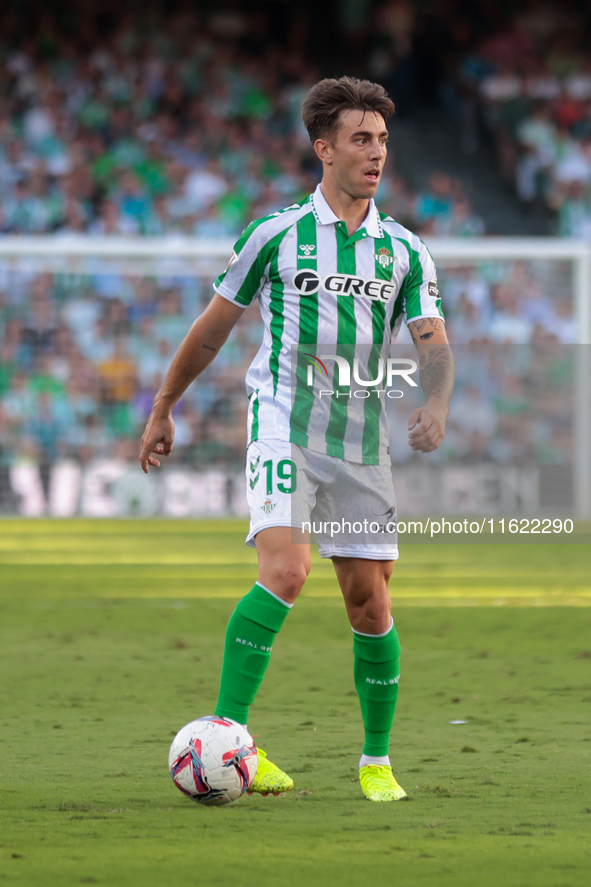 Iker Losada of Real Betis runs with the ball during the La Liga EA Sports match between Real Betis and RCD Espanyol at Benito Villamarin in...