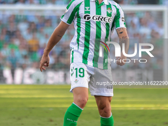 Iker Losada of Real Betis runs with the ball during the La Liga EA Sports match between Real Betis and RCD Espanyol at Benito Villamarin in...